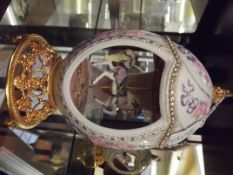 Musical carousel egg