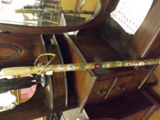 Hiking staff mounted with a large collection souve