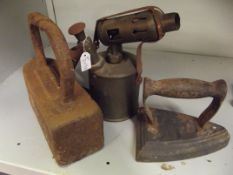 Two irons and a blow lamp