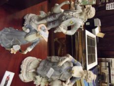 Three porcelain figurines