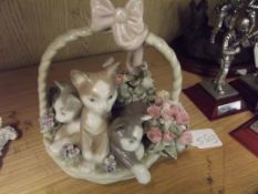 Lladro kittens in a basket