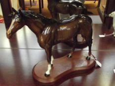 Very large Beswick horse on a plint