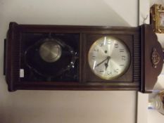 1930's oak cased wall clock, in working order