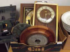 Various clocks to include a circular wall baromete