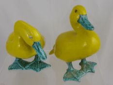 A Pair of Italian Pottery Cockerel, in pink and blue glaze, together with a pair of Italian