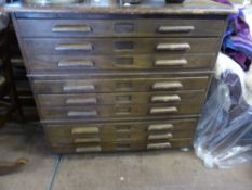 A Vintage 'Abbess' Plan Chest, with nine draw slides, 97 x 88 x 93 cms