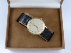 A Gentleman's Tissot 9ct Gold Wrist Watch, on black leather strap. (af)