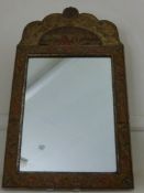 A Pair of 19th Century Tapestry Cushion Mirrors. Foliate-moulded brass cresting with shell motif