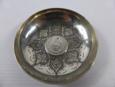 A Silver Persian Pin Dish, having a coin inserted to the centre.