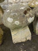 A Pair of Antique Saddle Stones, approx 70 cms tall.