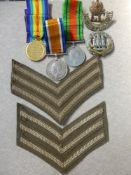 WWI and WWII Boxed Medals to Sgt C. Jacob, Northamptonshire Regiment, with badges and original paper