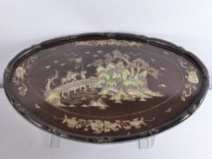 A Chinese Carved Plaque, with decorative Mother of Pearl inlay, depicting figures on the bridge of a