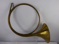 A Vintage French Hunting Horn (Trompe de chasse) together with a M. Hohner 