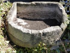 An Antique Cotswold Stone D-form Trough, approx 30 x 68 x 82 cms.