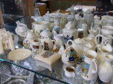 A Collection of Carlton and Arcadian Ware Miniatures, including a tank, sundial, urn, chicken,