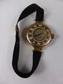 A Lady's Antique 9 Ct Gold Half Hunter Wrist Watch, the watch case mm A.G.R., case no. 1037095.