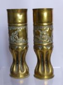 A Pair of WWI Brass 'Trench Art' Shells, the shells engraved to bottom 