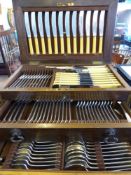 A Canteen of Silver Plated Cutlery, 12 pce setting with various accessories encased in a mahogany