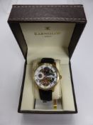 A Gentleman's Earnshaw 'Longitude' Wrist Watch, with the original box and papers.