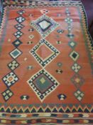 A 20th Century Turkish Kilim, of geometric design, pink, celadon, blue and cream colouring, approx