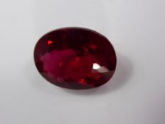 An Oval Red Topaz Loose Stone, 27.18 ct, 20.9 x 16 x 8.4 mm.