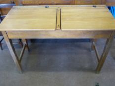 A Vintage Pine Double Seated School Desk, with lift up top, approx 69 x 45 x 102 cms.