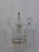 Two Cut Glass Decanters together with one Continental hand painted Carafe. (3)
