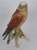 A Goebel Porcelain Figure of a Kestrel, impressed mark CV110-1969, together with a hand painted