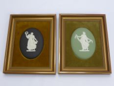 Two Wedgwood Oval Plaques, depicting The Graces, mounted in velvet lined frames, the plaques
