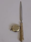 A Solid Silver Vesta Case, together with a Georgian silver table spoon and silver handled letter