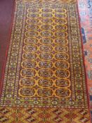 A 20th Century Persian Woollen Rug, burgundy on ochre ground 36 central gül, , surrounded by