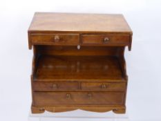 An Oak Apprentice Piece Dresser, with pierced back, two short drawers above and two short drawers