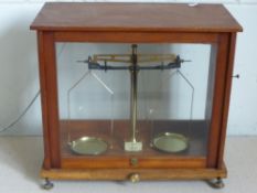 A Set of Scientific Scales, together with Baird and Matlock of London weights.