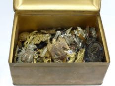 A Quantity of Various Military Insignia, including Badges, Buttons and Medallions.