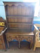 An Oak Cottage Dresser, with two short drawers above three spice drawers, approx 91 x 162 x 36 cms.