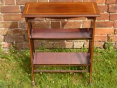 An Art Nouveau Magazine Rack, with decorative inlay, on casters, approx 60 x 25 x 77 cms.