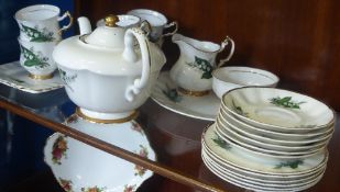 A Fine Bone China Tea Set, 'Luberne' with 22 k Gold Trim, comprising rectangular sandwich plate,