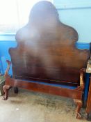 A Mahogany Bed Frame in the Dutch Style, with carved floral border, approx 170 x 145 cms.