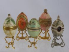 A Collection of Hand Made Italian Decorative Eggs, some with small animals inside, on stands. (11)