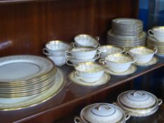 A Fine Bone China 'Aynsley' Dinner Service, comprising two lidded serving dishes, oval meat plate,