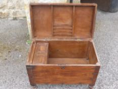 A Georgian Mahogany Campaign Chest, the chest having panel lidded candle box with letter rack, on
