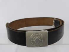 A Feuerschutzpolizei (Fire Police) Buckle and Belt, the leather belt is stamped with the words 