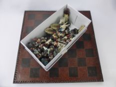 A Resin Chess Board with playing figures of the Napoleonic era.