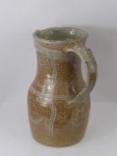 Ray Finch (1914-2012) Winchcombe Pottery, A red pottery Coffee Pot with cream glaze spout and lid