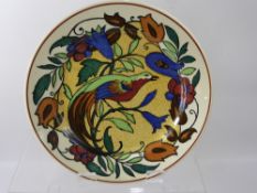 A Pair of Early 20th Century Royal Doulton Rack Plates, depicting a bird of paradise amongst