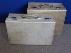 A Collection of Antique Horse Brasses together with two Vintage Pig Skin Cases..