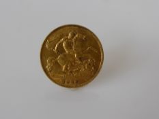 A 1910 Solid Gold Edward VII Half Sovereign .