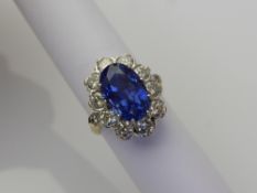 A 7.05 Ct Natural Vivid Cornflower Blue Ceylon Sapphire & Diamond Ring. The natural non - heat