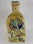 Antique Polychrome Bottle and Cover Iznik, hand painted with turbaned figure to one side and a