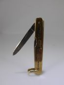 A 9 ct Gold Pen Knife, mm FM & Co., engraved to side, total wt 14.5 gms.